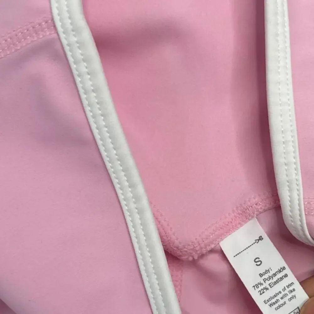 Alo Yoga pink flare leggings with white waistband size small gym low rise